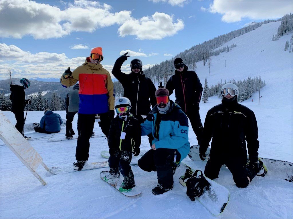 Jaxson Hamm with his dad's snowboard buddies altogether at Mt. Spokane..