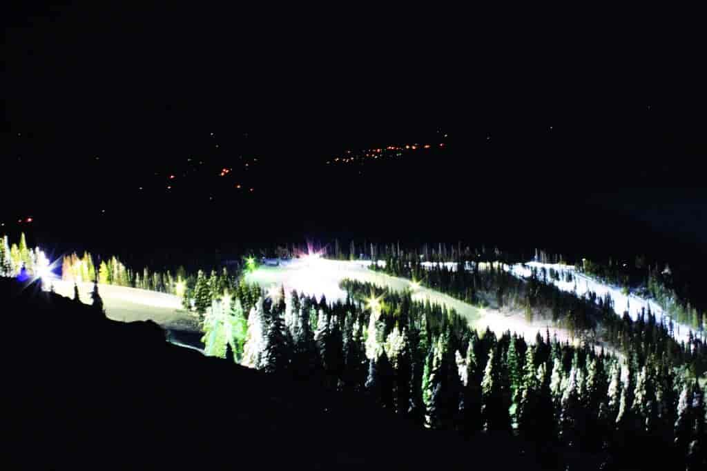 Photo of Mount Spokane all lit up at night from far away.