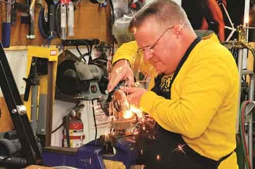Sparks fly at the hands of Glen Copus, who makes Spokane's best bikes. Photo: Hank Greer