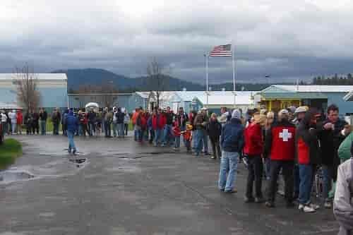 Fleece-clad shoppers clutching coffee cups stand outside in an organized line, waiting for the doors to open. Photo courtesy of Winter Swap