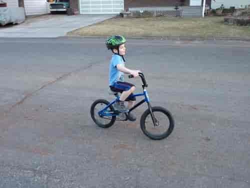 Child riding a bike.