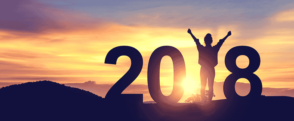 Photo of sunset with 2018 in the foreground.