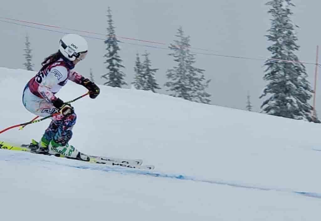 Ski Racer skiing down hill.