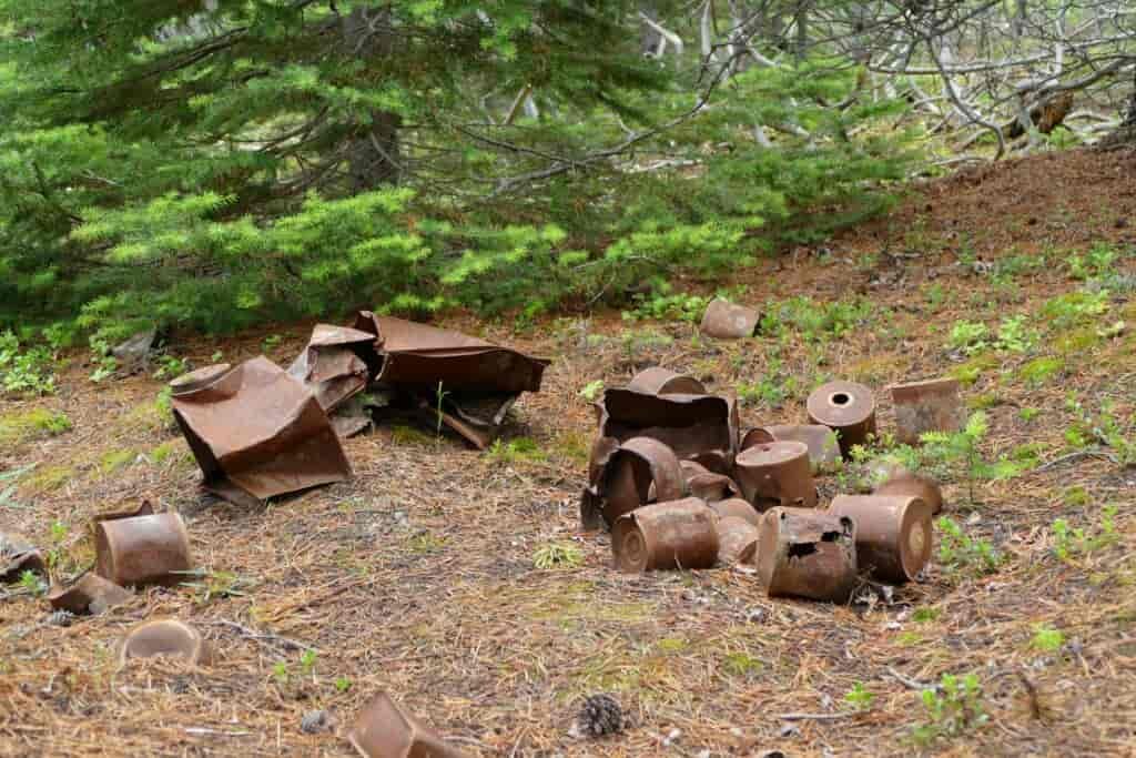 Rusted metal trash left behind on public lands.